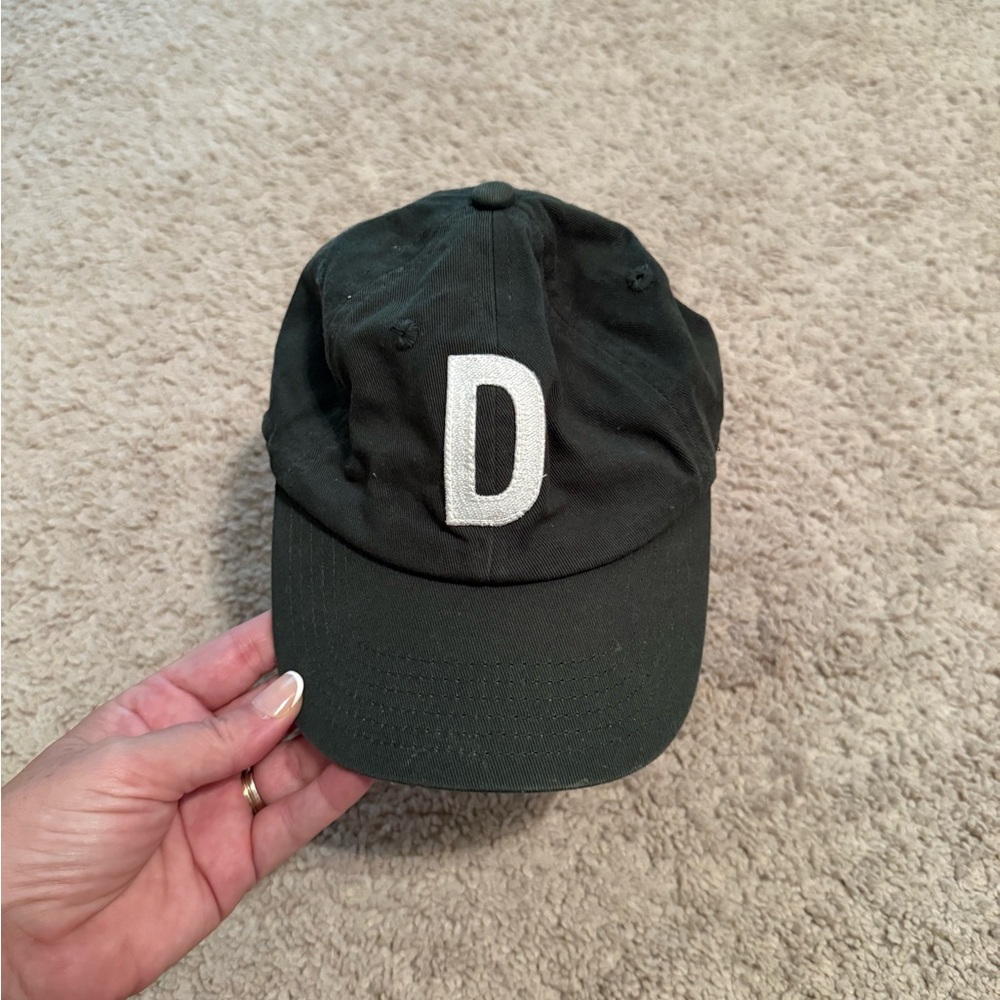 Green Cap with White Letter D